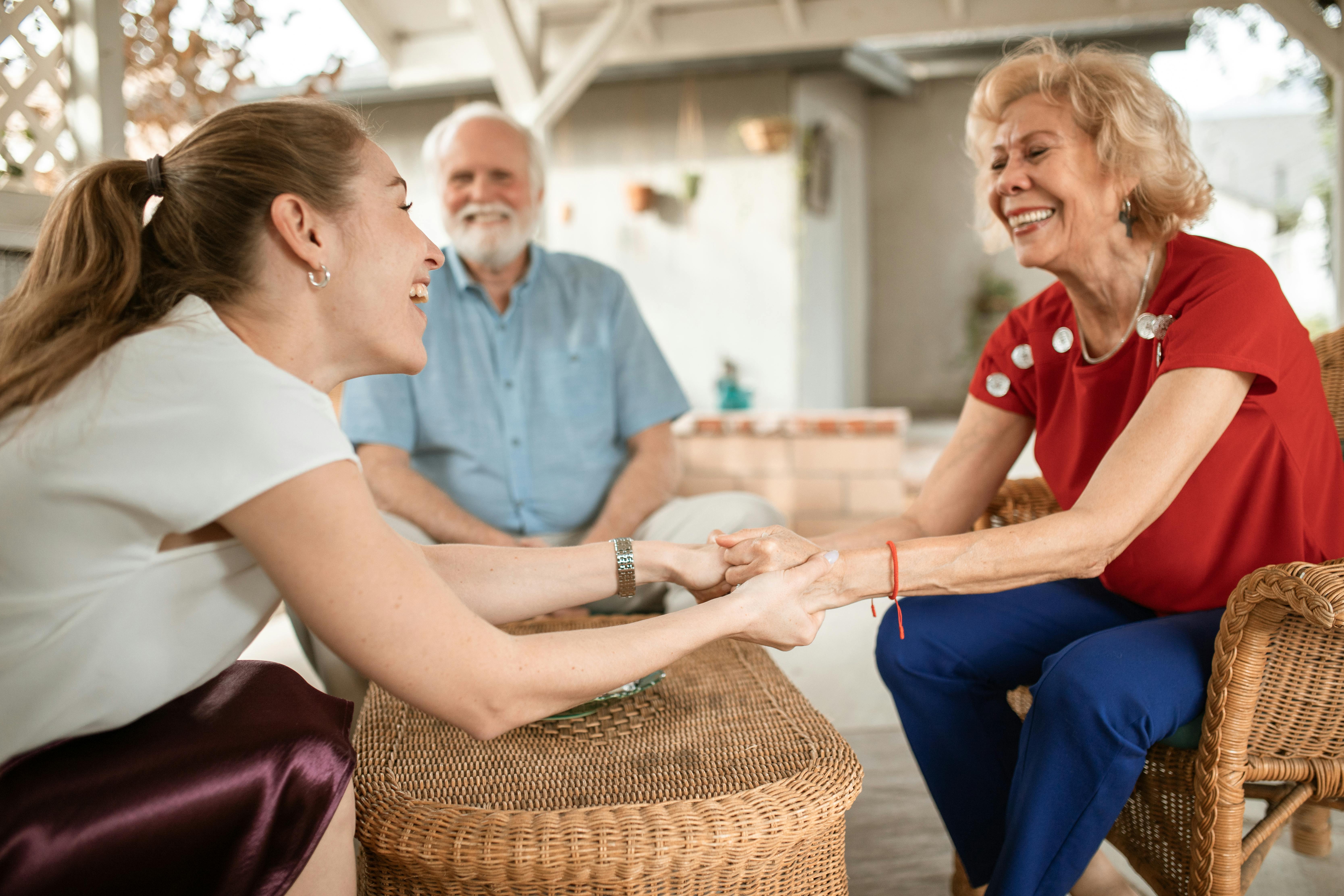 Residents enjoying activities in a comfortable common area at our Minnesota assisted living facility